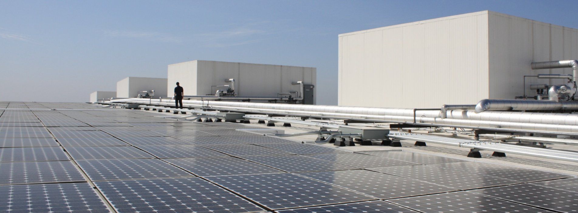 Worker on a roof of a building