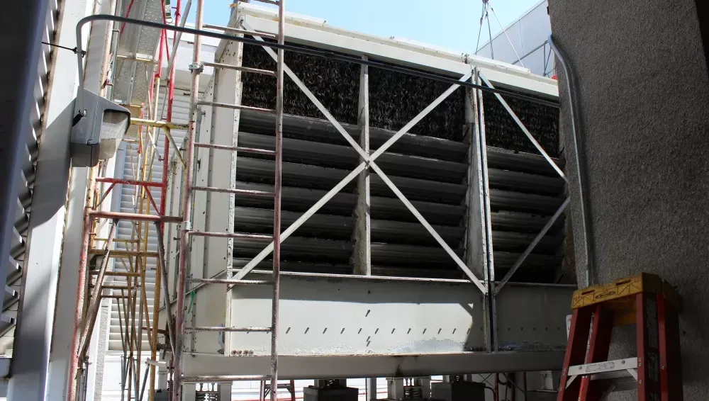 Large AC unit being inspected