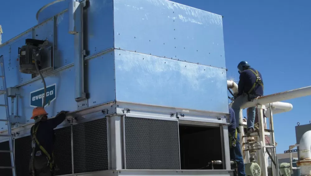 AC unit being installed