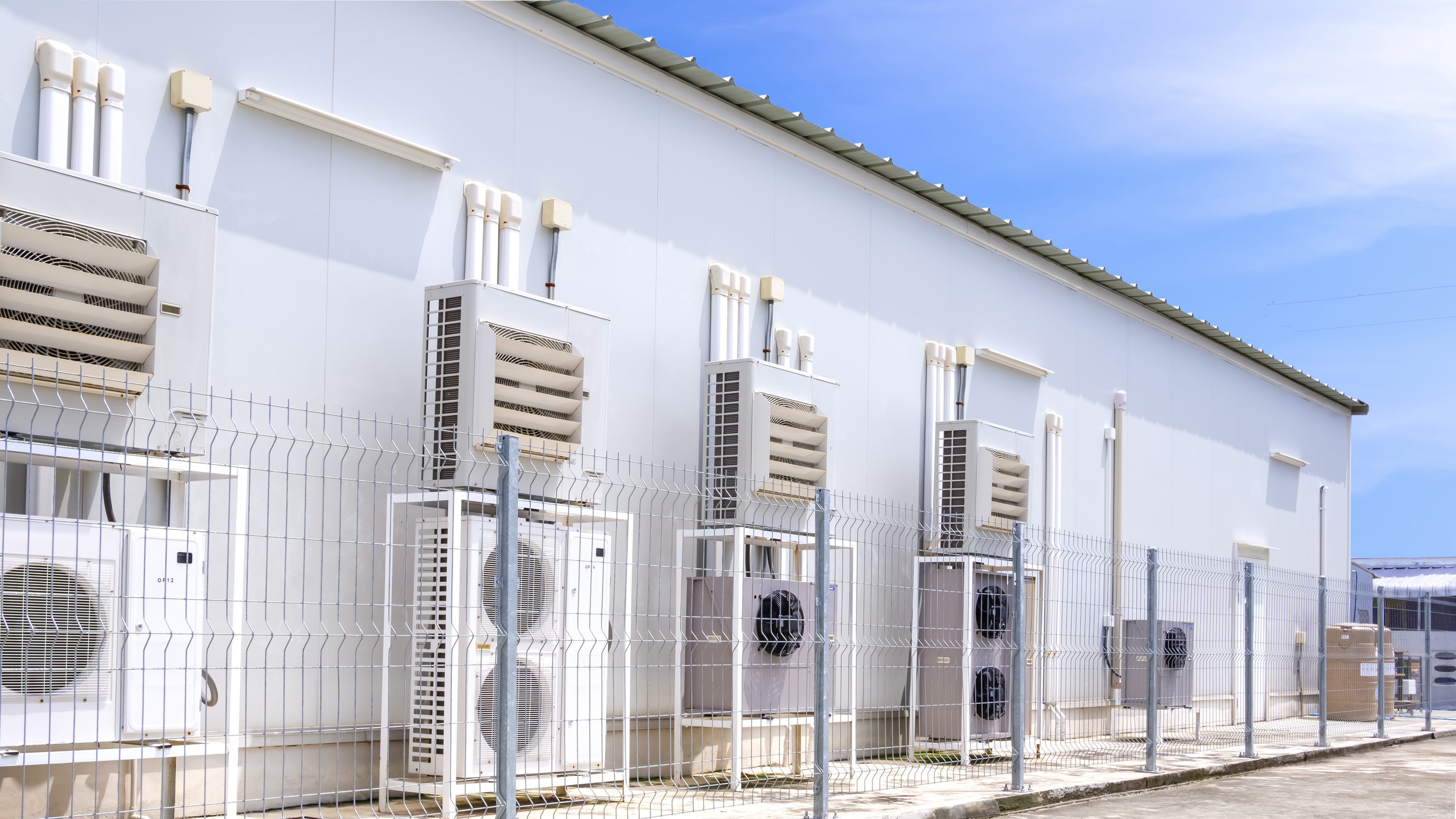 air-conditioner-compressors-with-ventilation-equipment-hvac-system-outside-convenience-store